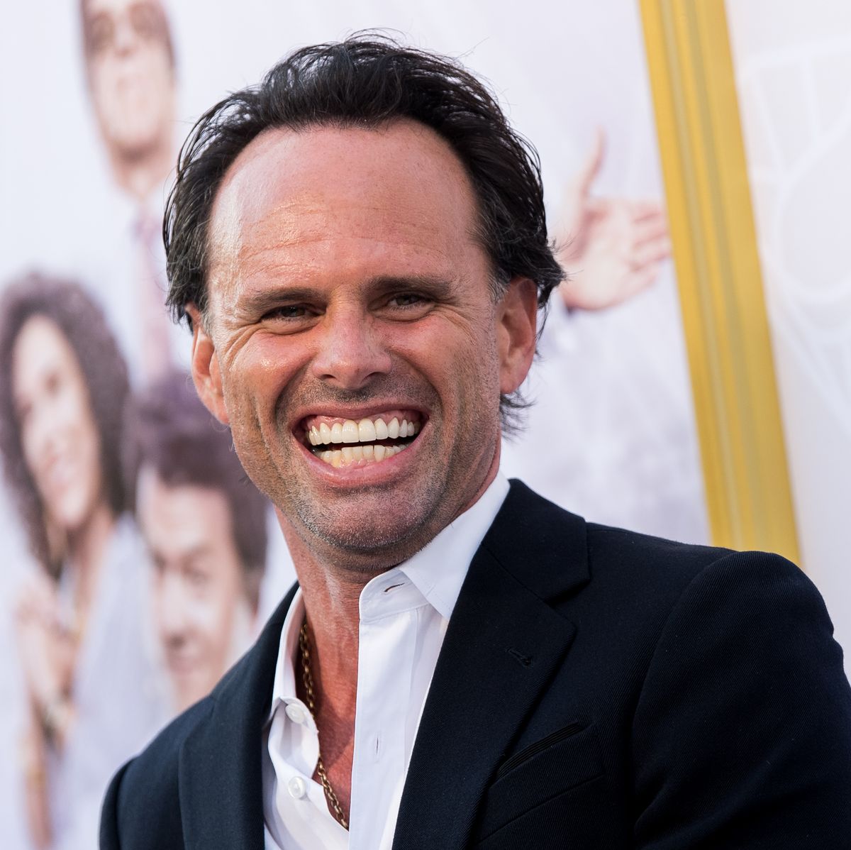 Walton Goggins smiling naturally, revealing slightly uneven but distinctive teeth that reflect his signature look and spark ongoing dental speculation.